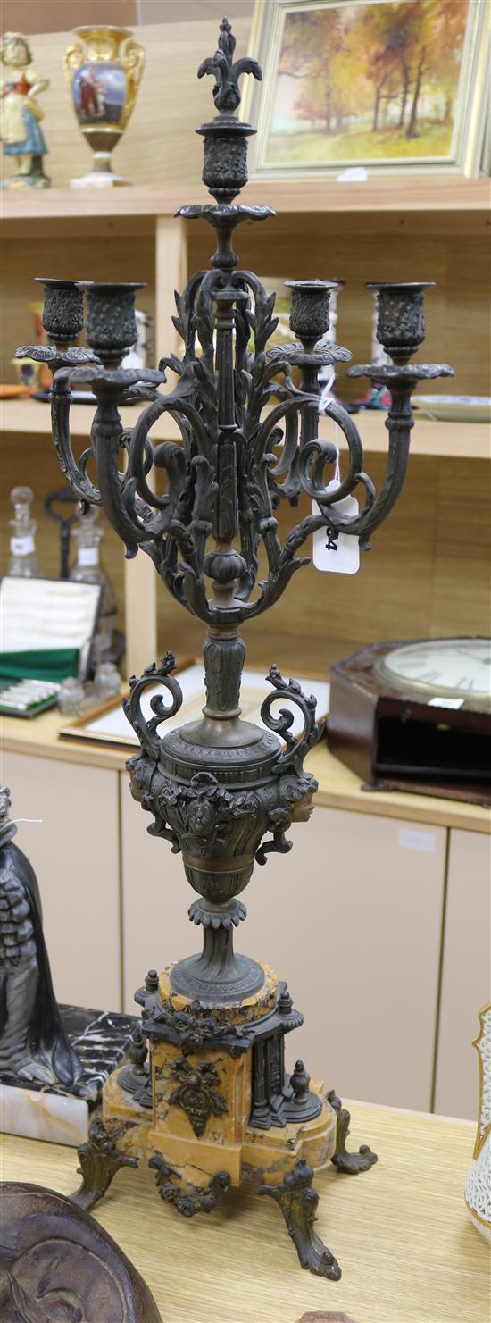 A 19th century marble base candelabra